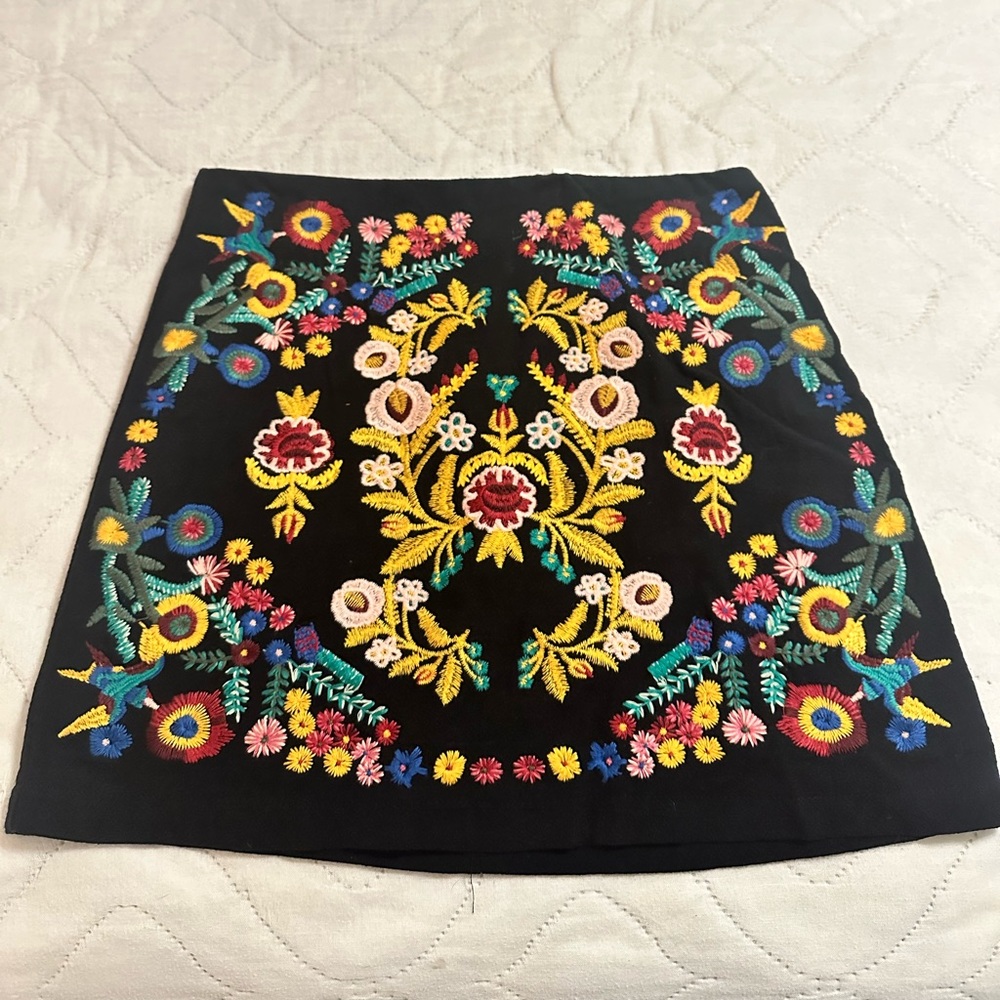 Black floral mini skirt